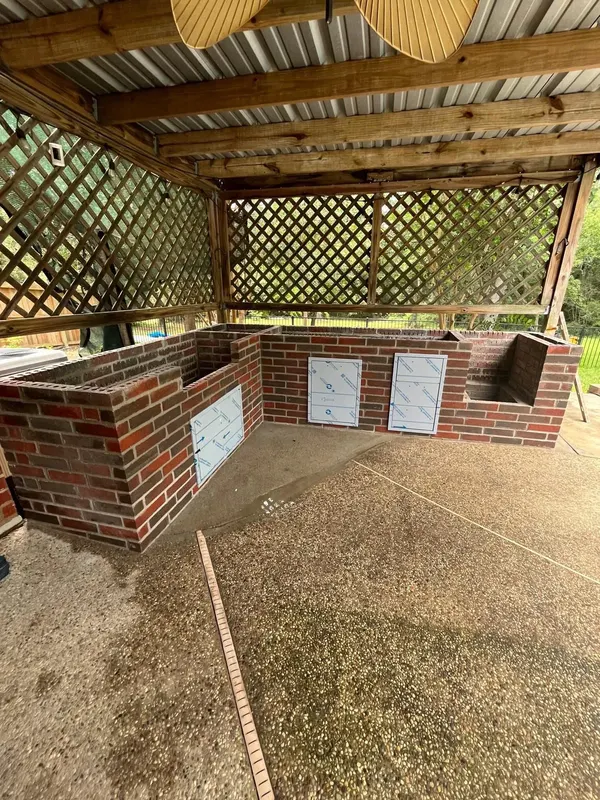 L-shaped brick base finished and ready for countertops