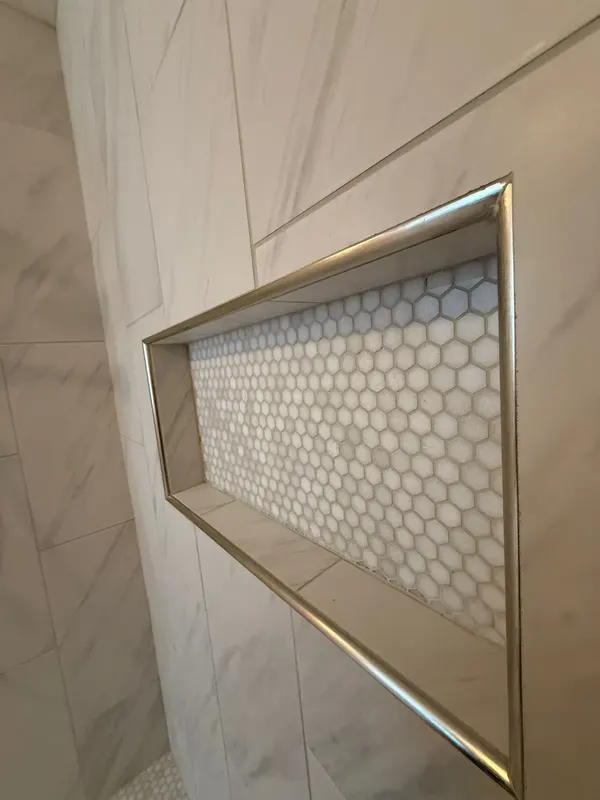 Hexagon mosaic niche with metal edge trim